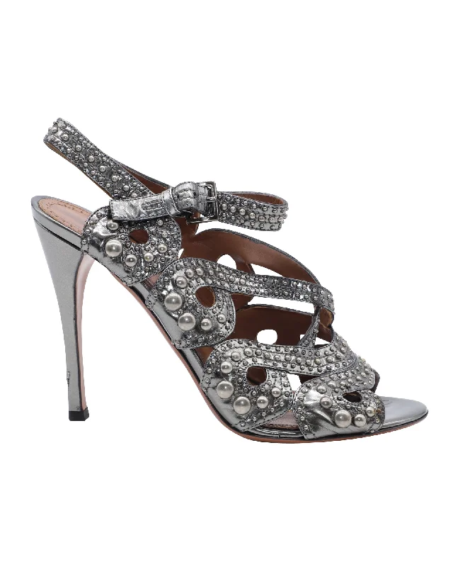 Women's pointed - toe slingback stiletto heel pumps in a peep - toe designAlaia Studded Strappy High Heels in Silver Leather