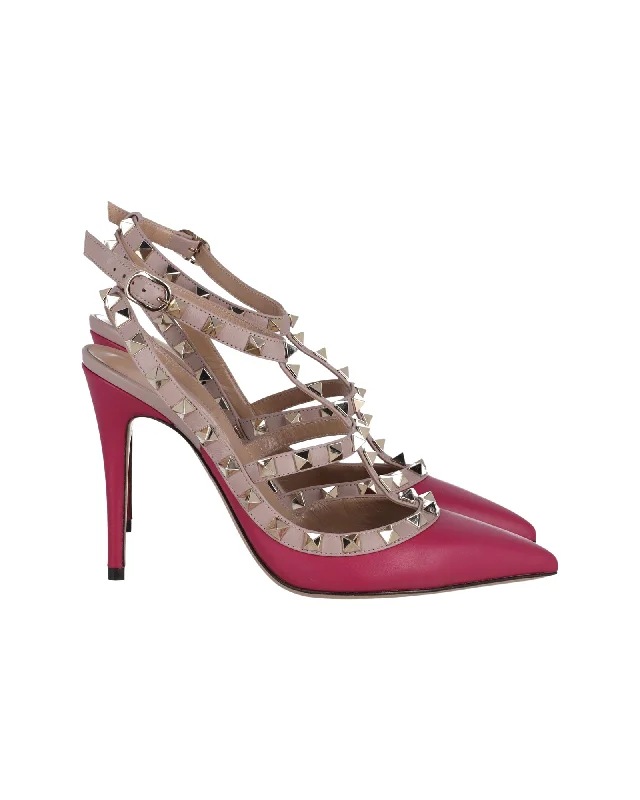 Women's date - night stiletto heel pumps with a sexy silhouetteValentino Rockstud Sandals in  Pink Leather